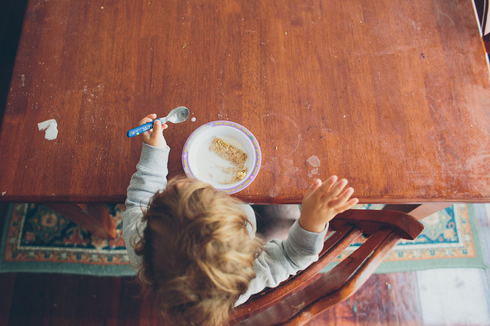 Kid eats breakfast - Family Documentary Photography