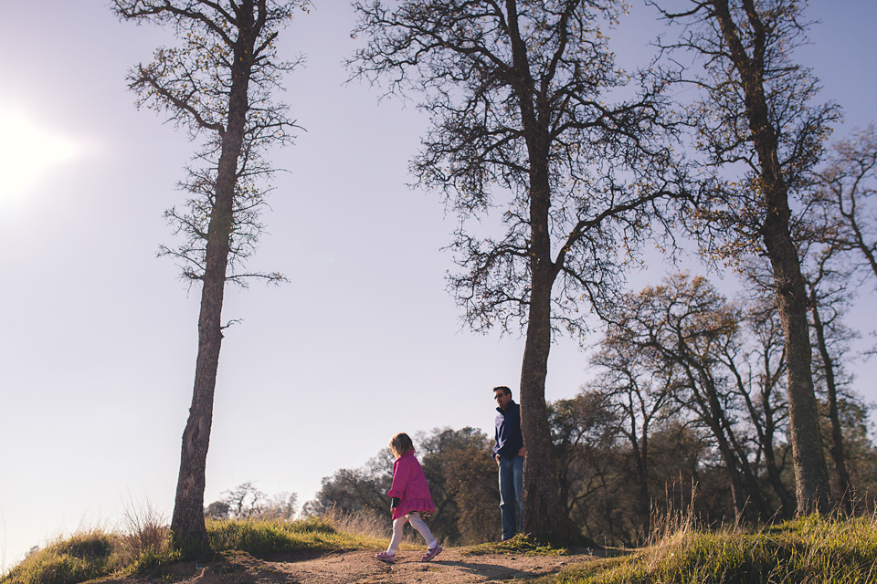 Little girl takes a walk with dad in the park - Family Documentary Photography