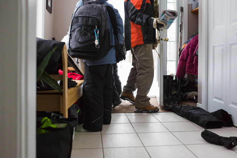 Leaving for school in winter coats - Family Documentary Photography