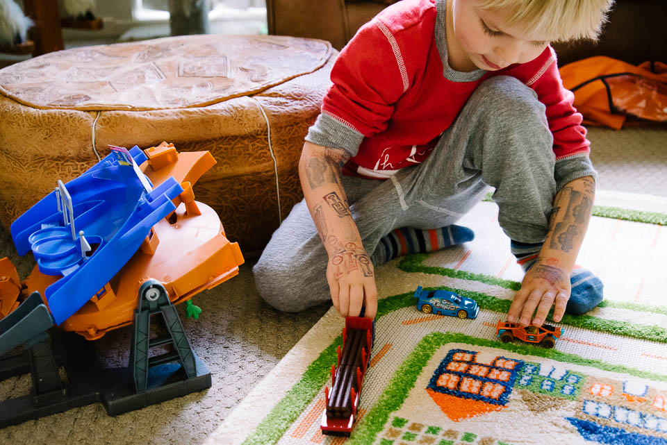 Family Documentary Photography - Little boy with trains