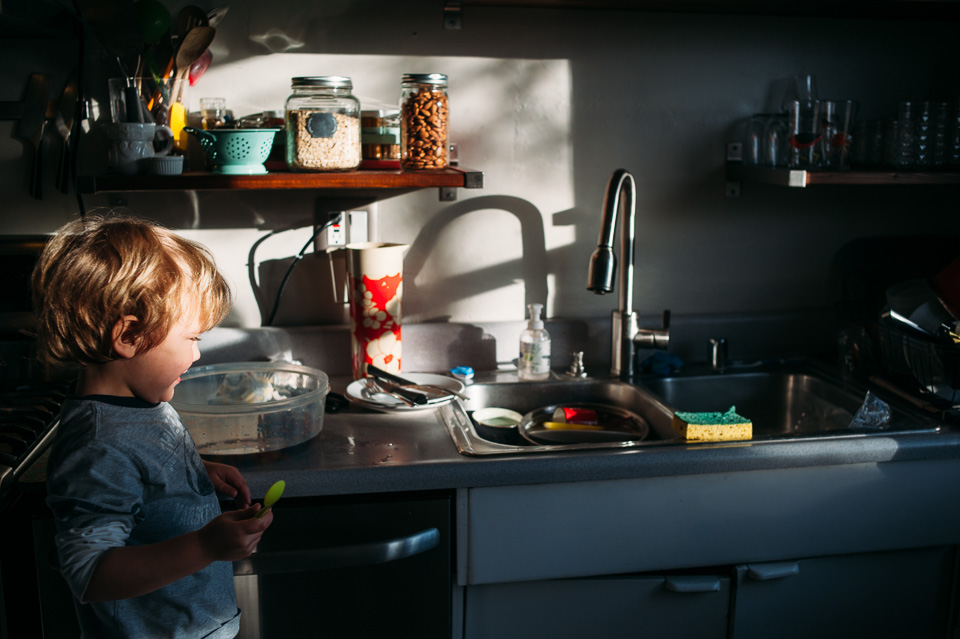 Little boy in messy kitchen Family Documentary Photography