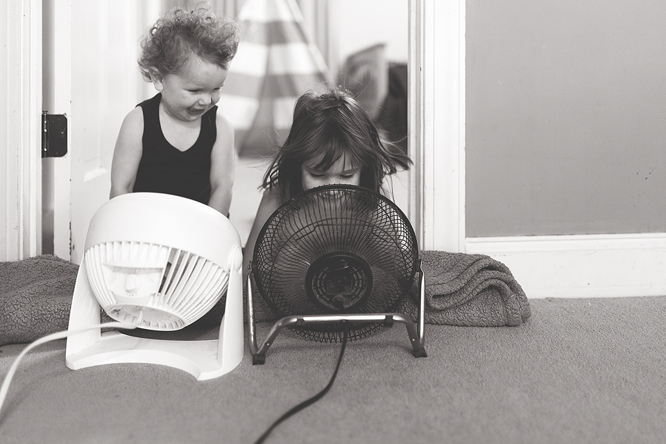 kids yelling into fans - family documentary photography