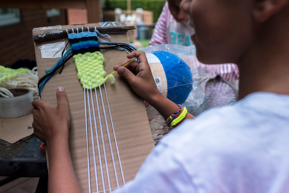 girl weaving - family documentary photography