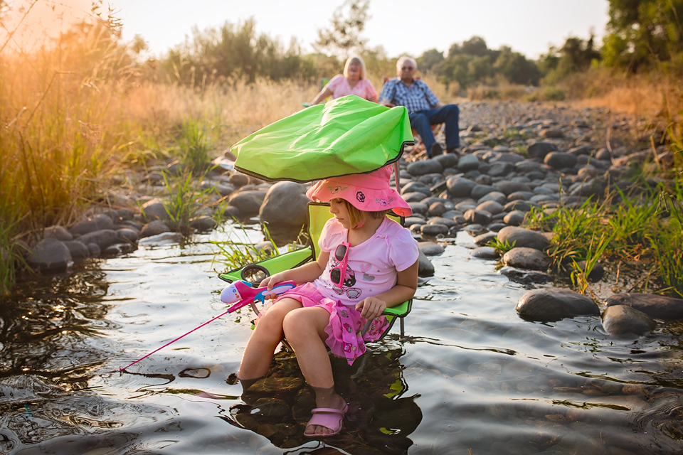 girl fishing - family documentary photography