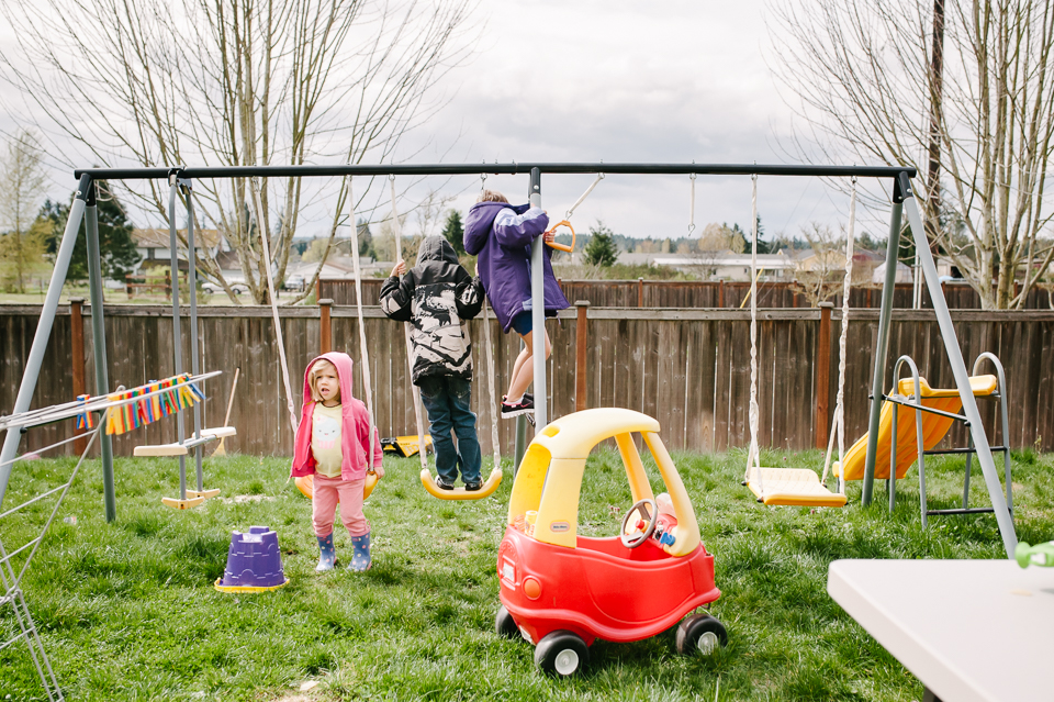 kids on swingset - family documentary photography