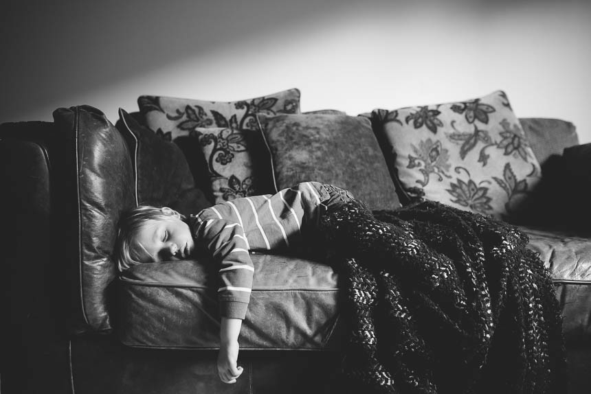 boy sleeping on couch - family documentary photography