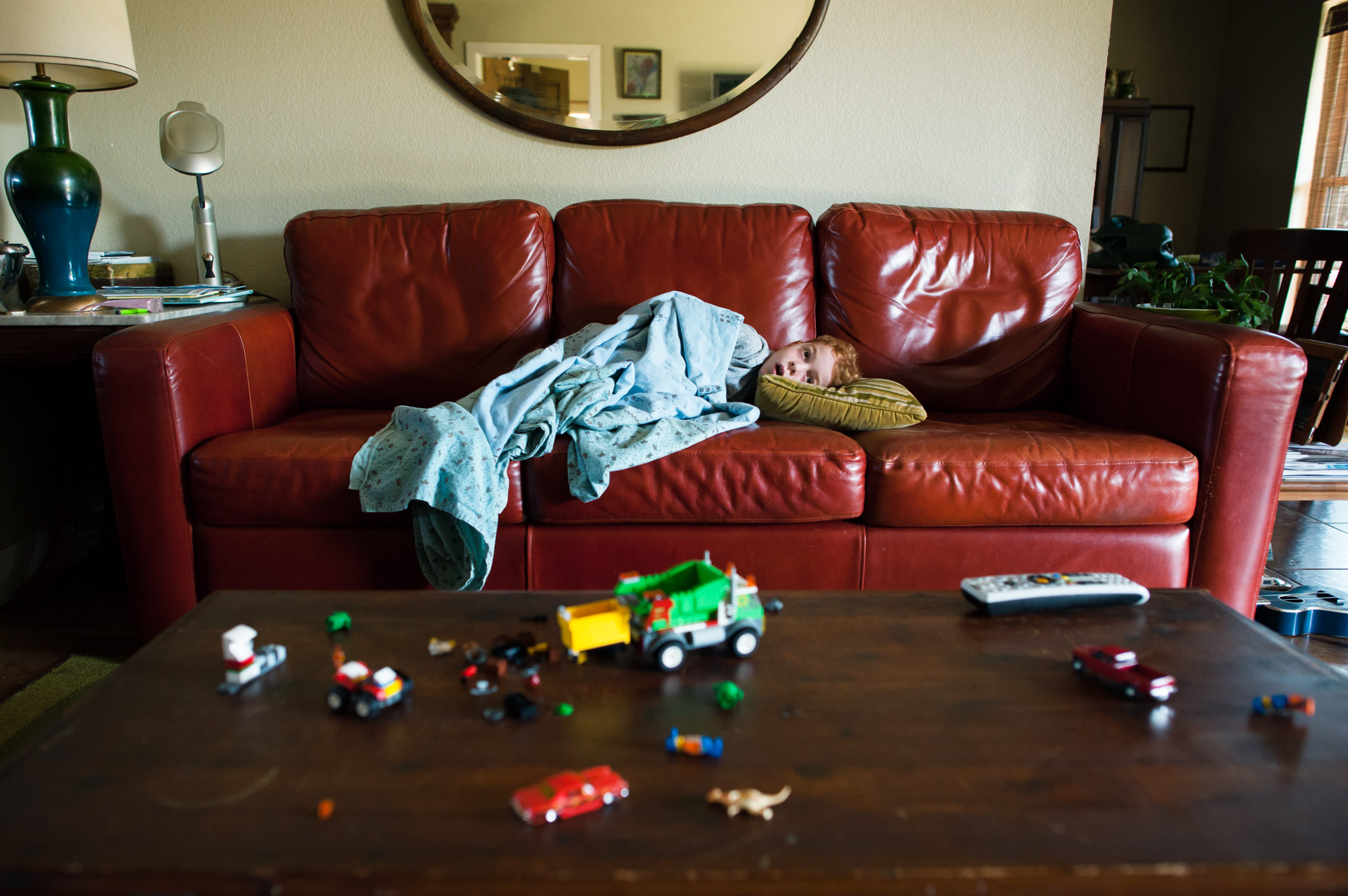 boy on couch - family documentary photography