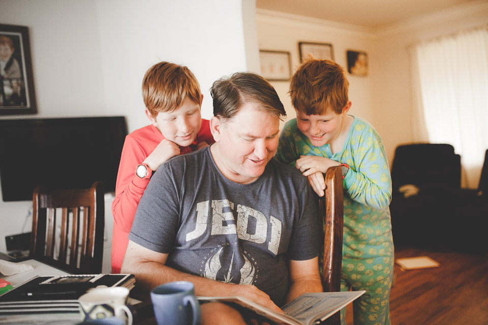 father reading to boys - family documentary photography
