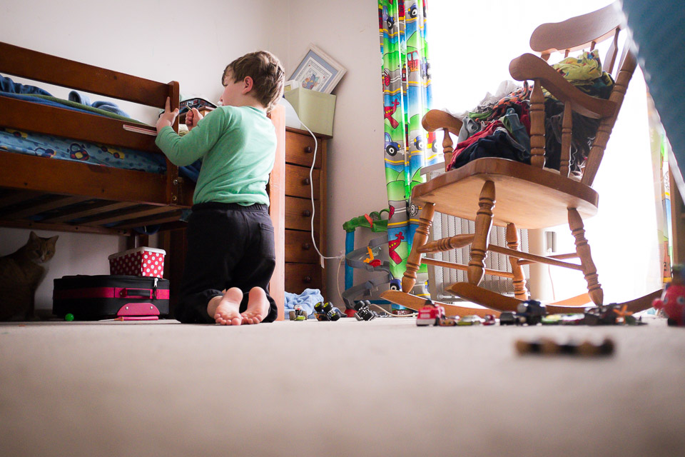 boy playing in bedroom - Family Documentary Photography