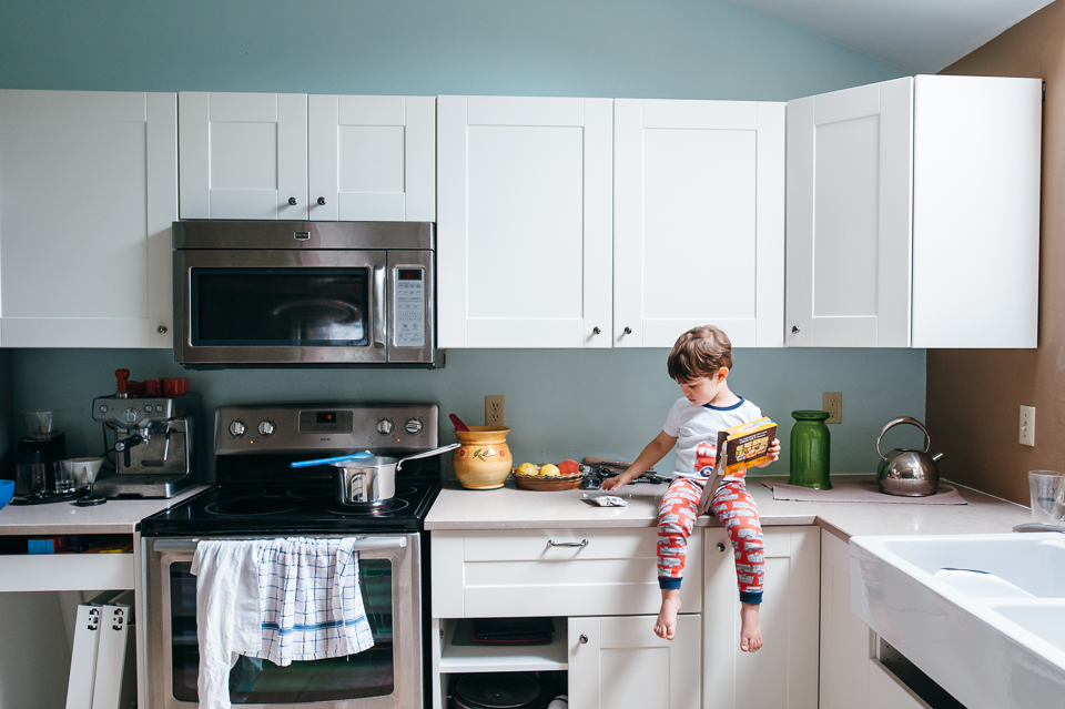 boy on kitchen counter - Family Documentary Photography