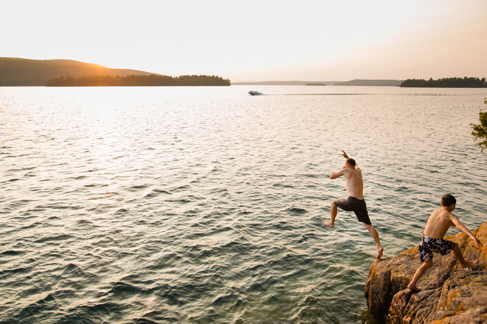 boy jumping into lake - Family Documentary Photography