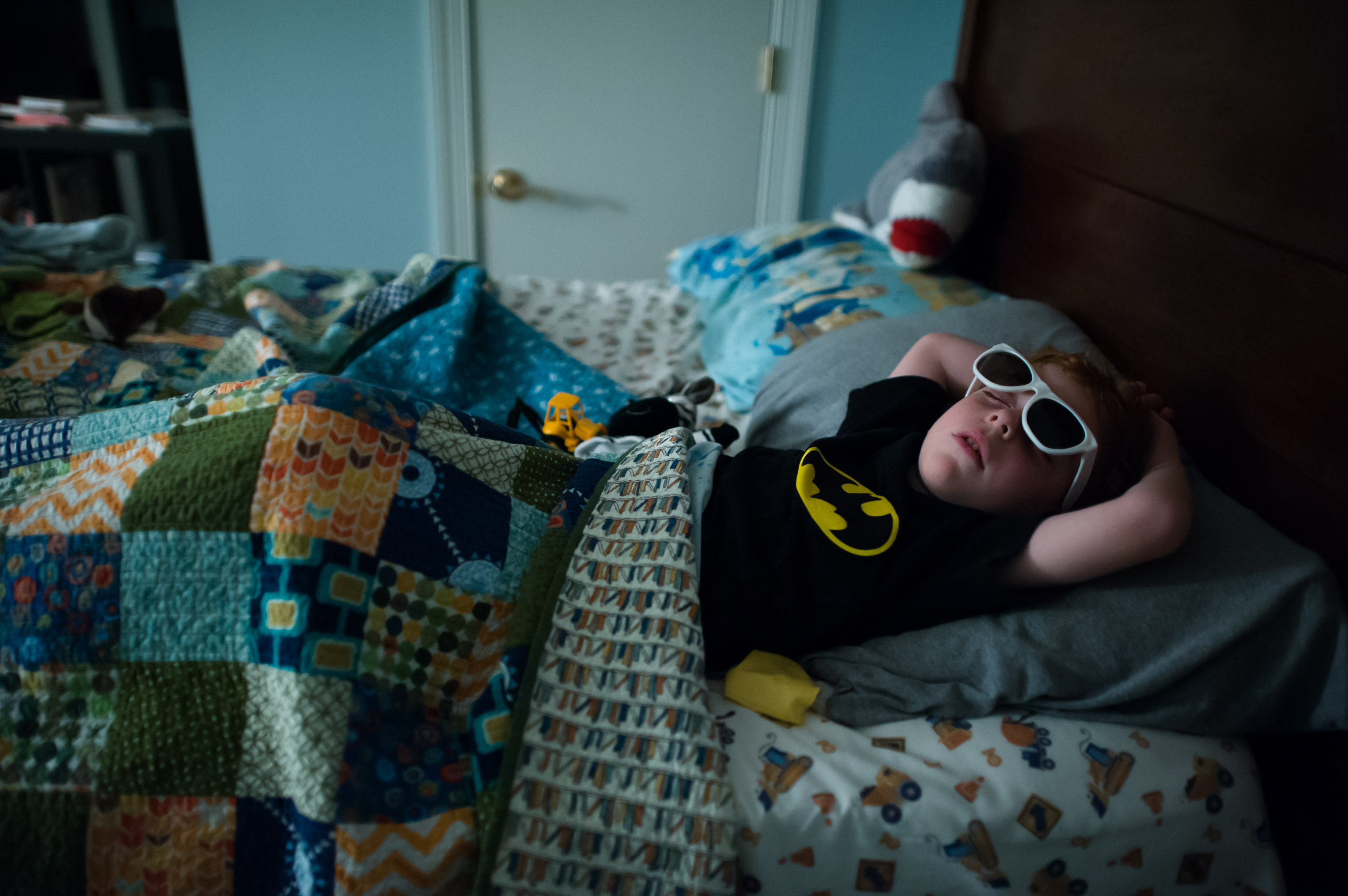 boy asleep with sunglasses - Family documentary photography