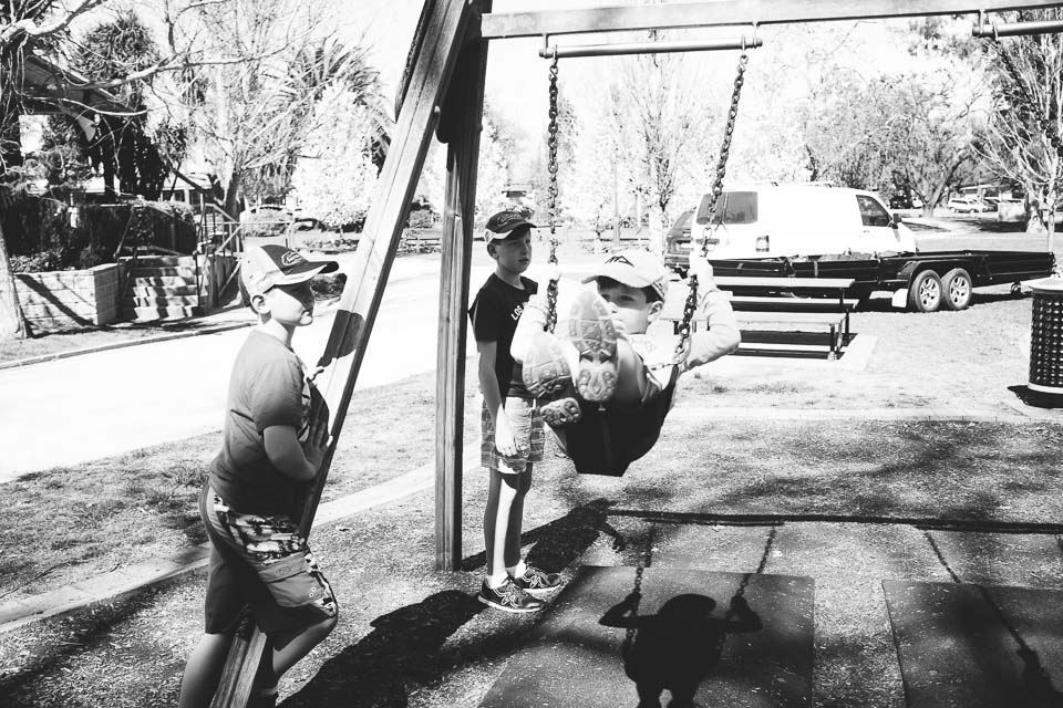 Kids on swingset - Family Documentary Photography