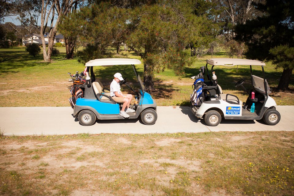 kids on golf carts - documentary family photography