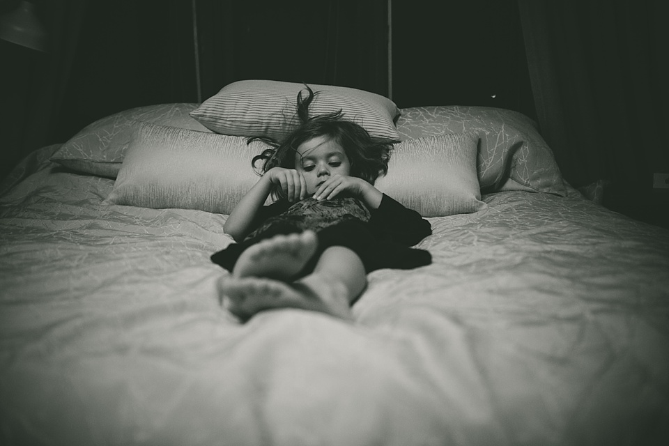 girl lying in bed - Family Documentary Photography