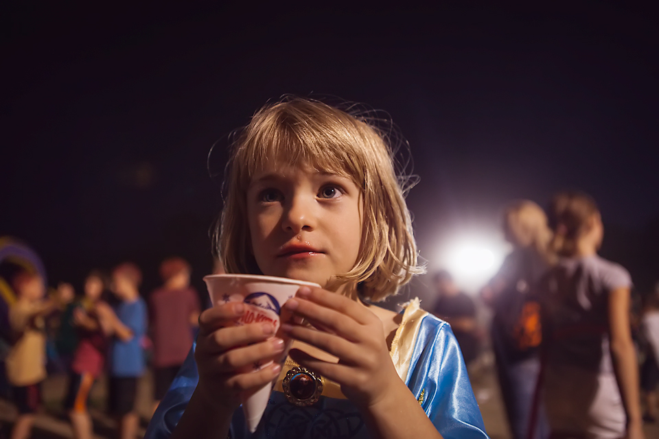 girl with shaved ice at the movies - documentary family photography