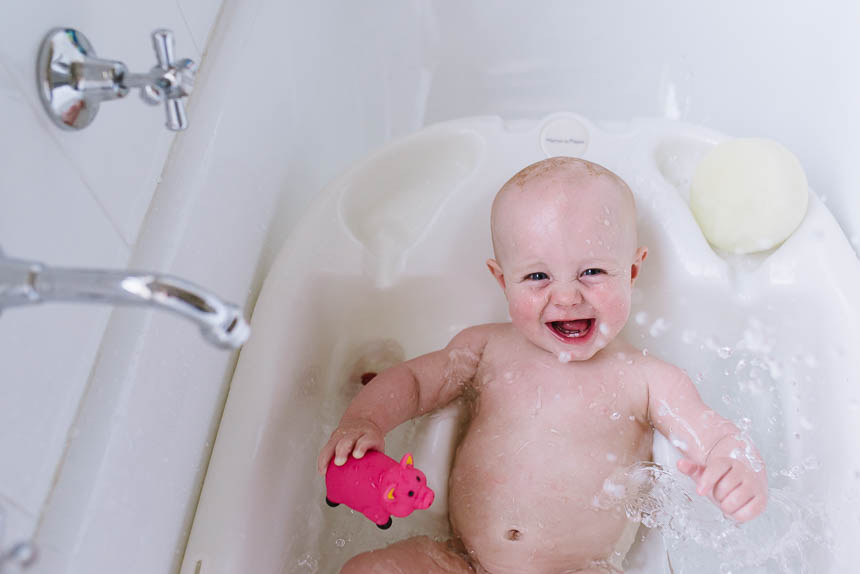 baby giggling in bath - documentary family photography