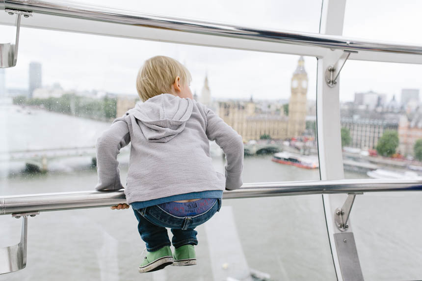 boy sitting on railing - Family Documentary Photography