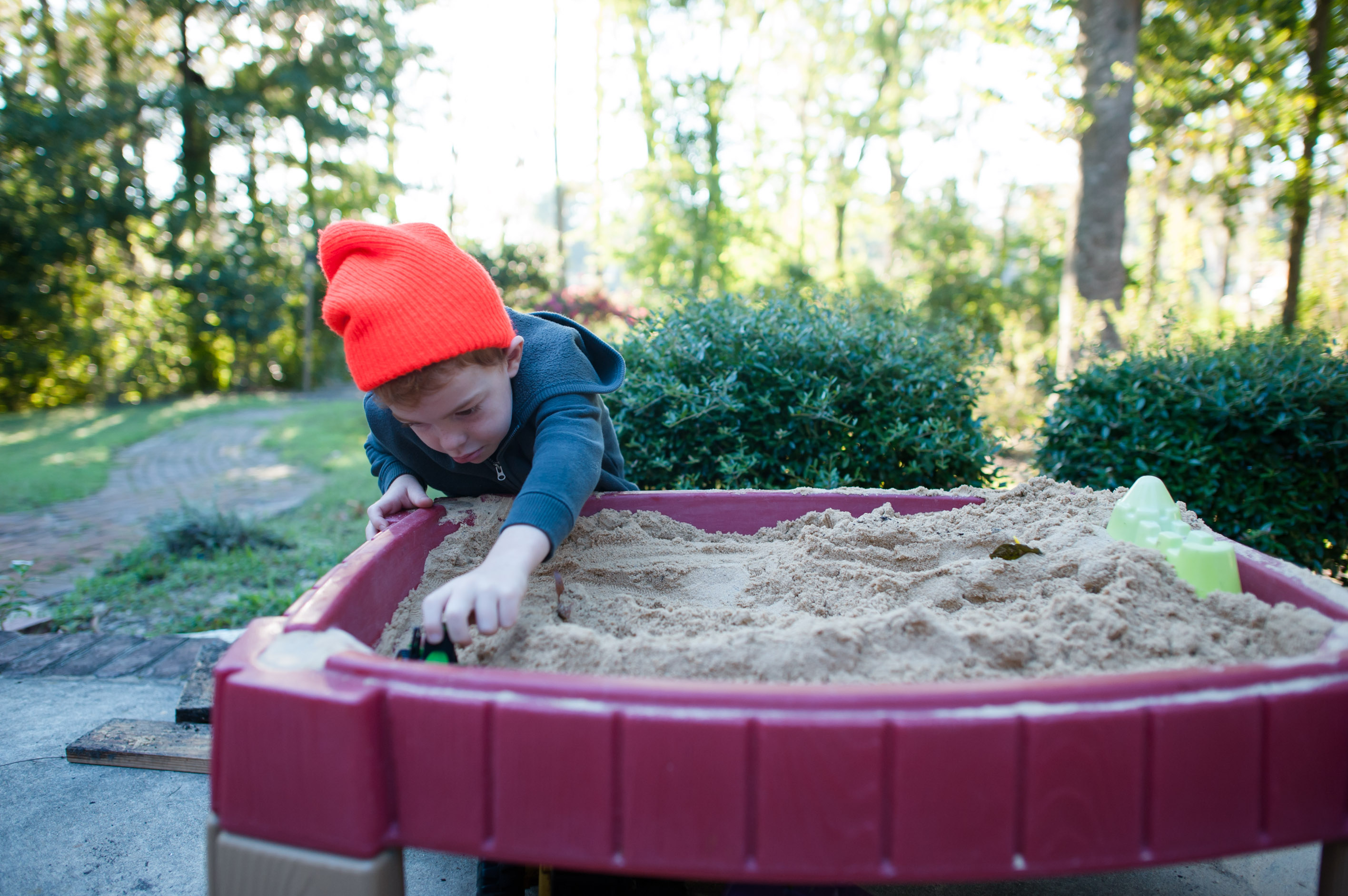 boy playing in sandbox - Family Documentary Photography