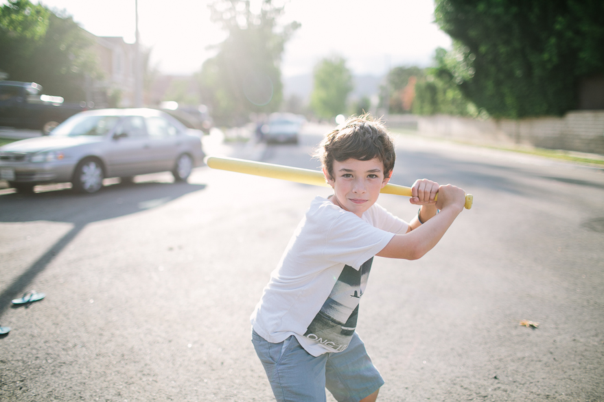 boy with wiffle bat - documentary family photography