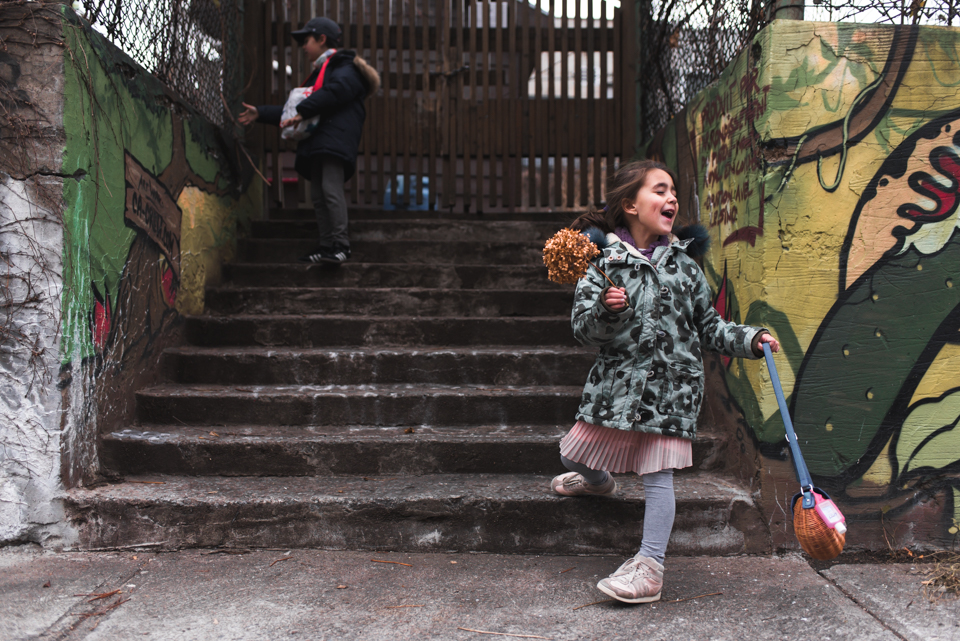 girl running down urban steps - Family Documentary Photography