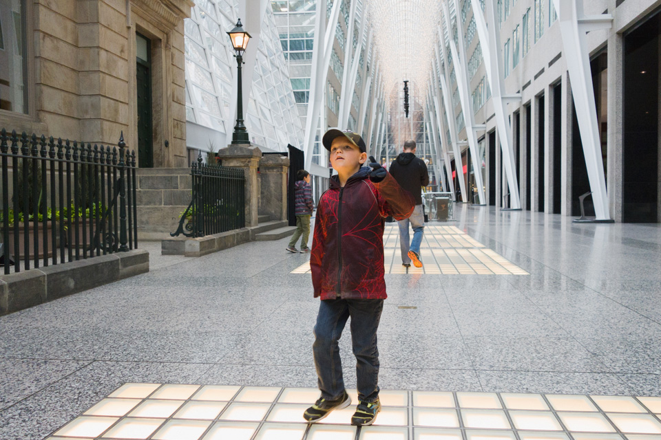 boy in walkway - Family Documentary Photography