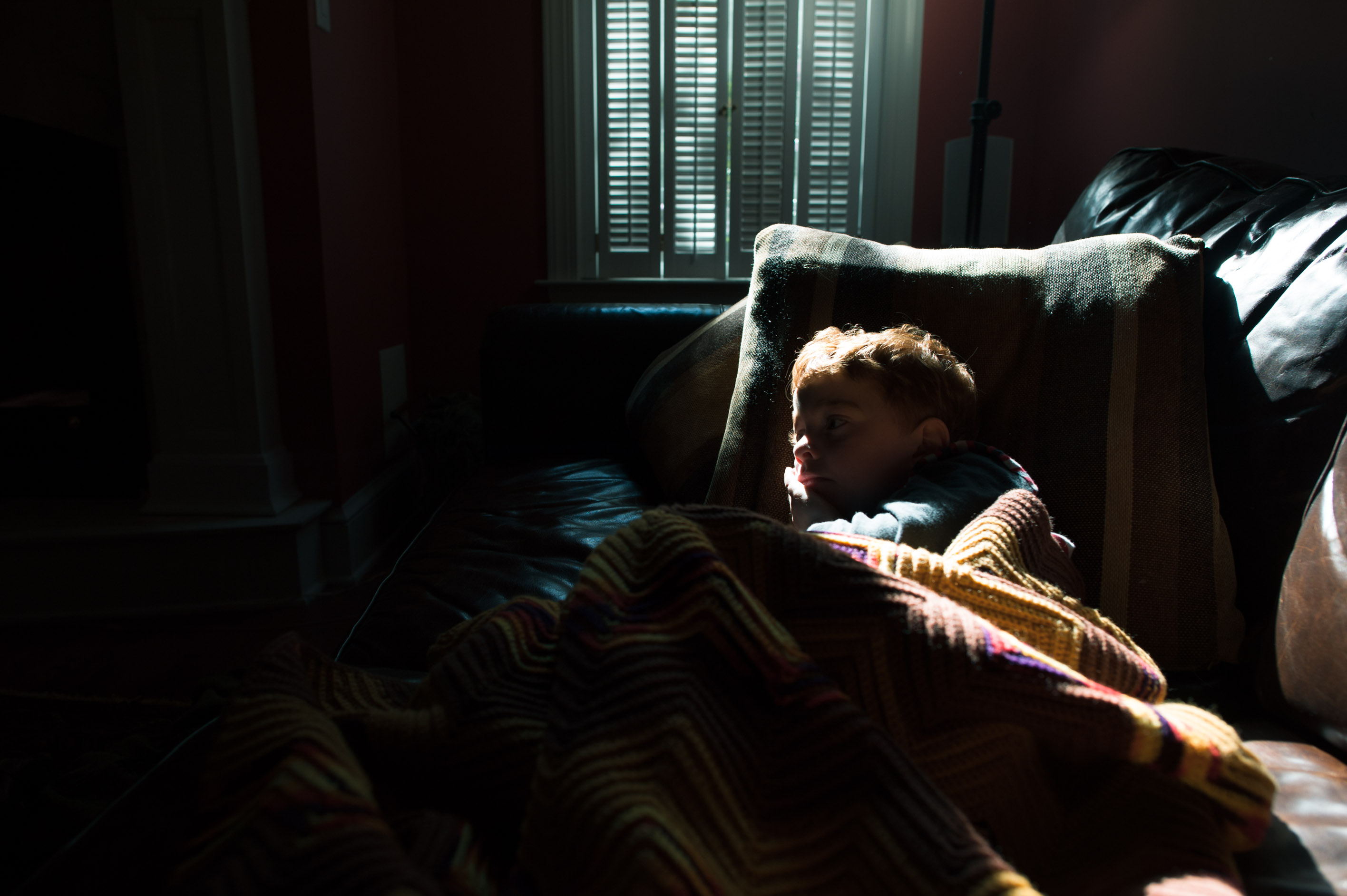 Boy asleep on Couch - Family Documentary Photography