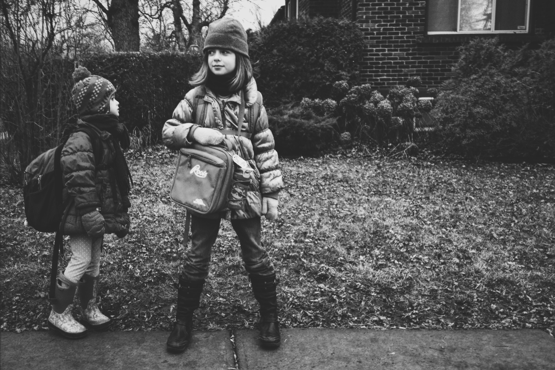 girls wait at bus stop - Family Documentary Photography