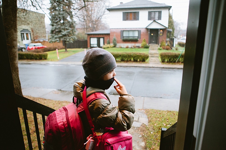 child bundled and waiting for school - Family Documentary Photography