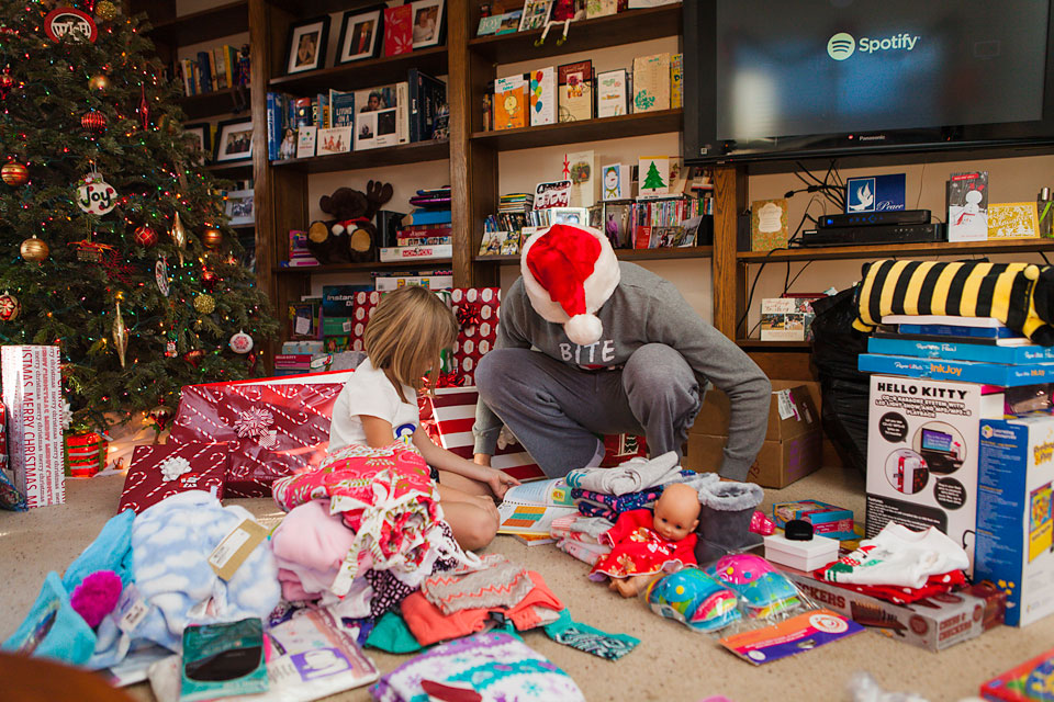 girl and father on christmas morning - Family Documentary Photography