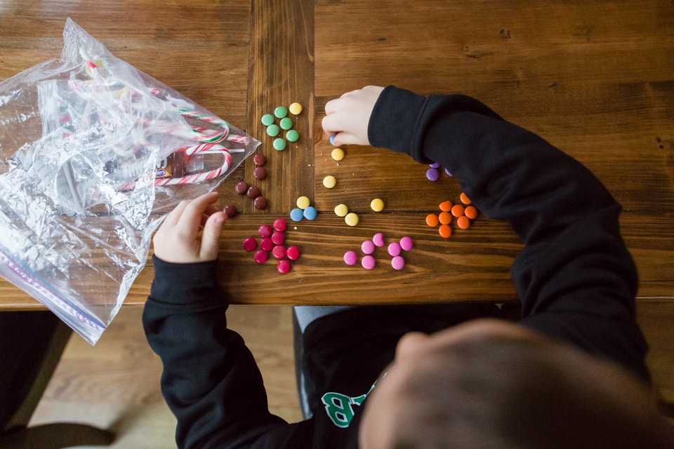 boy sorting candy - Family Documentary Photography