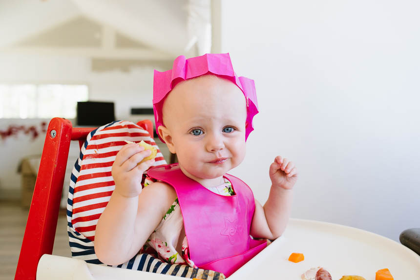 baby with pink paper crown - Family Documentary Photography