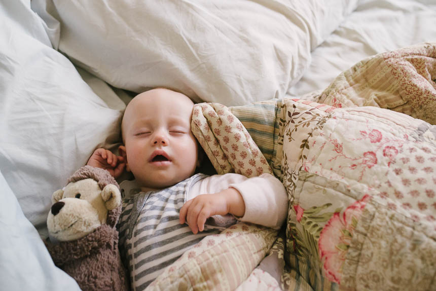 Cuddled Sleeping baby - Family Documentary Photography