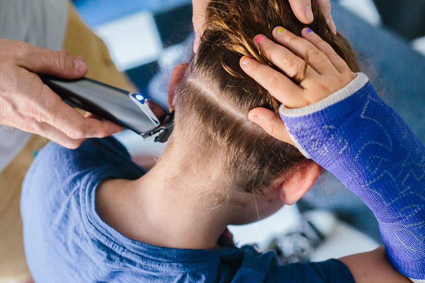 girl getting undercut - Documentary Family Photography