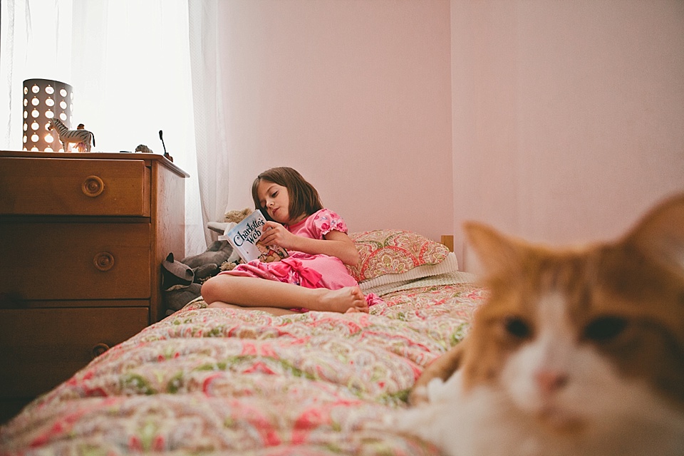 girl reading in bedroom - Documentary Family Photography