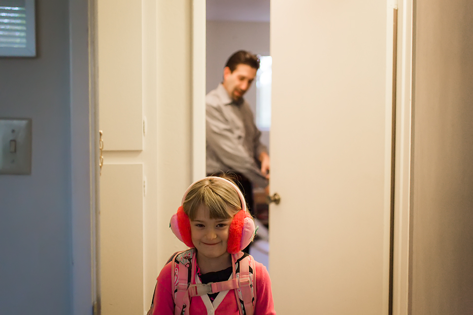 girl with earmuffs - Documentary Family Photography