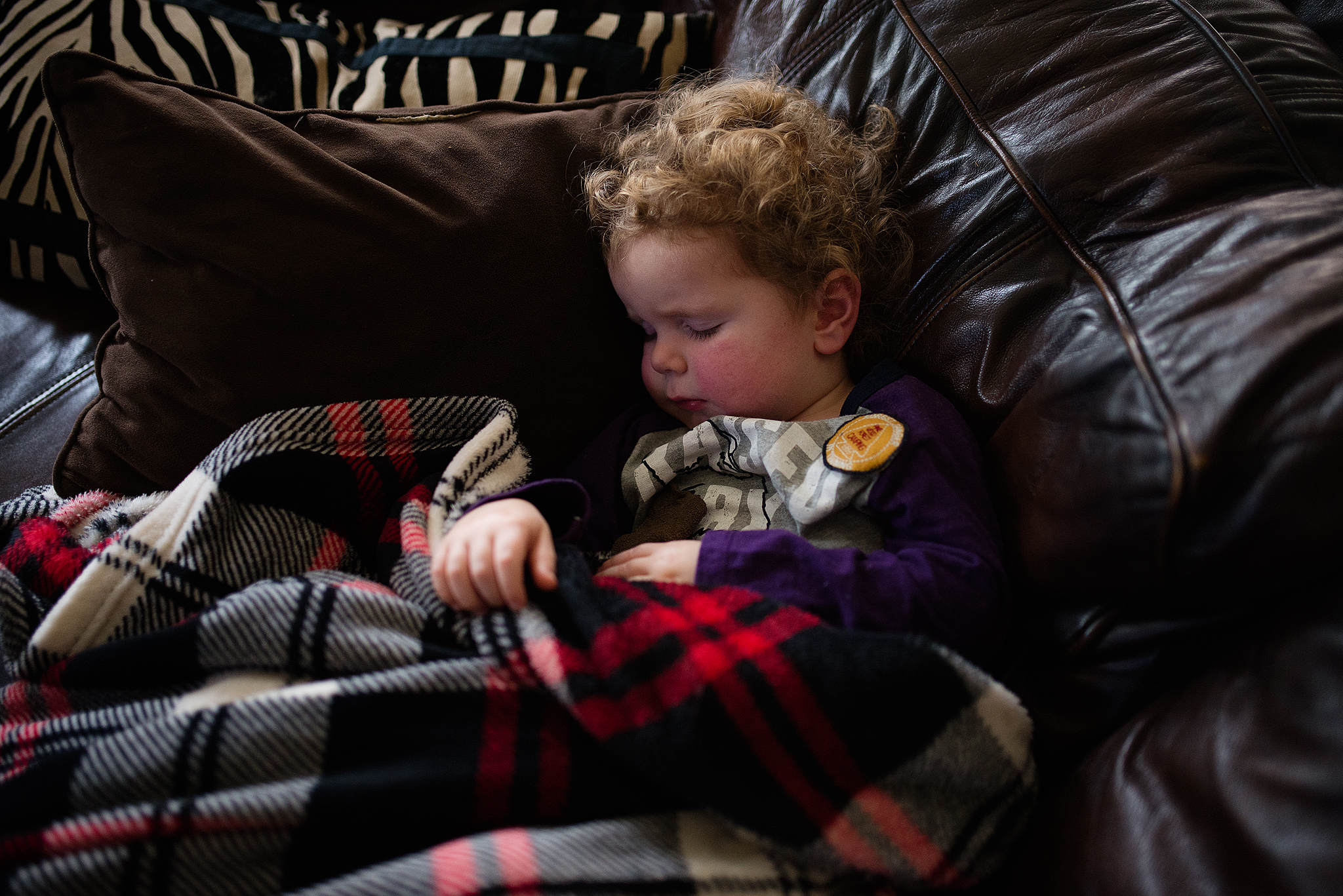 Child asleep on couch - Family Documentary Photography