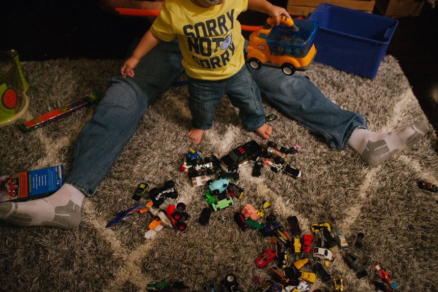 Toys spread on floor - Family Documentary Photography