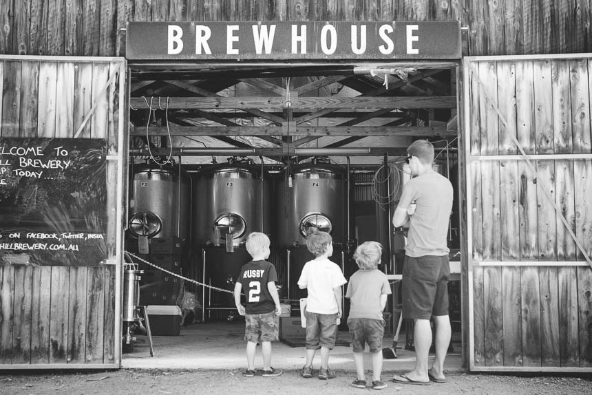 Kids stand with Dad a brewery - Family Documentary Photography