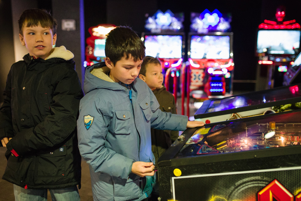 boys at arcade - Documentary Family Photography