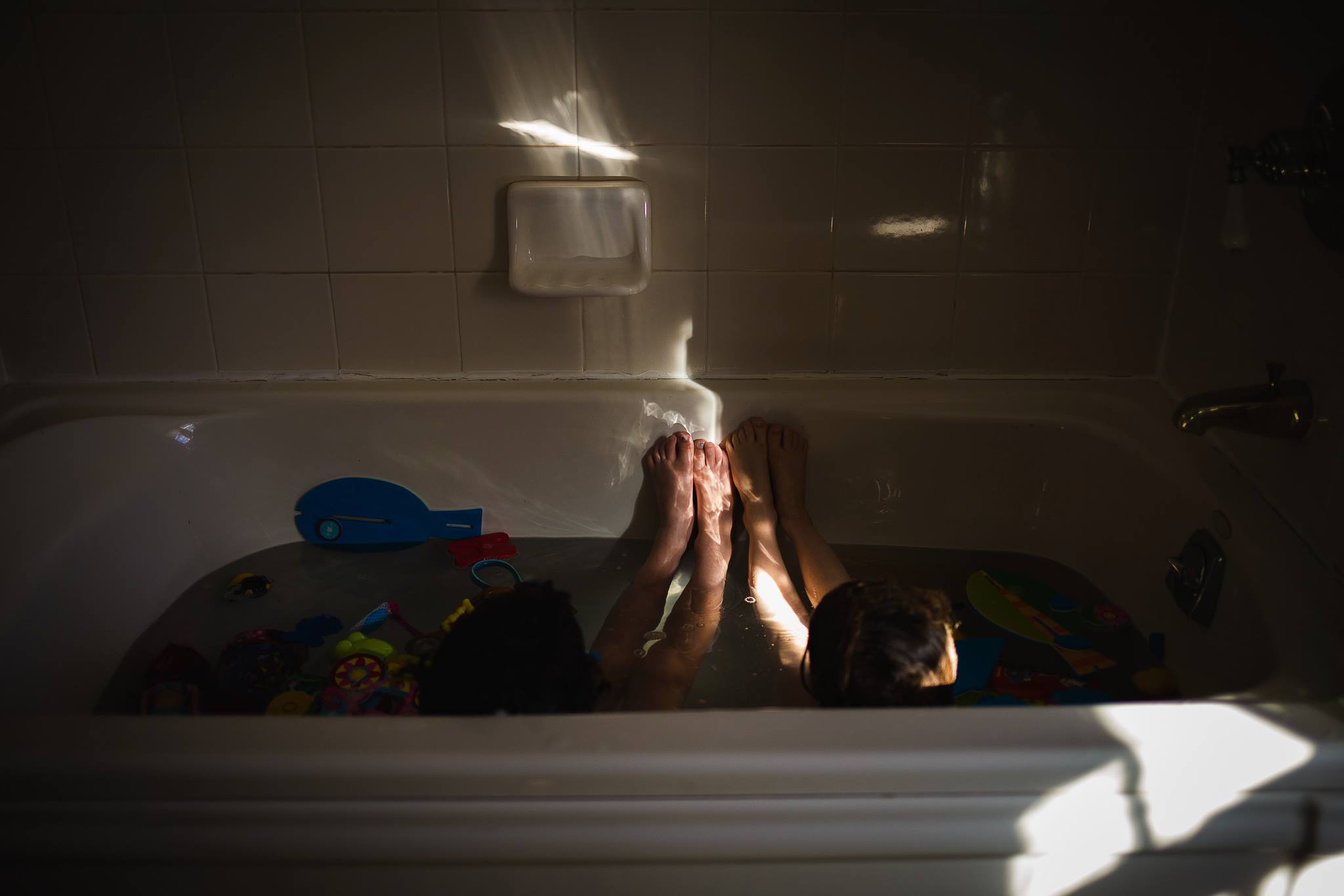 kid's feet in bath tub - Documentary Family Photography