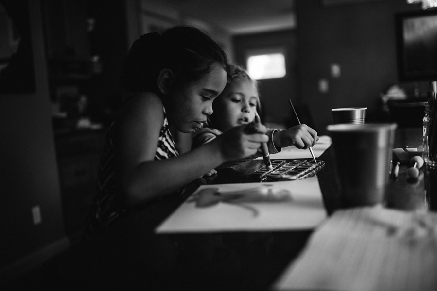 two girls painting - family documentary photography