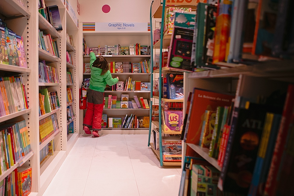 girl in coat at library - Documentary Family Photography