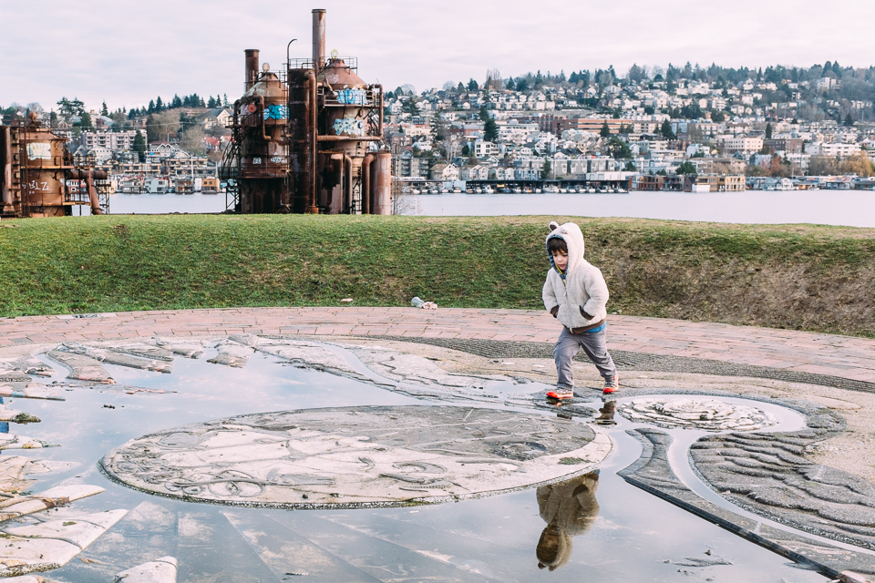 boy jumping over puddle -Documentary Family Photography