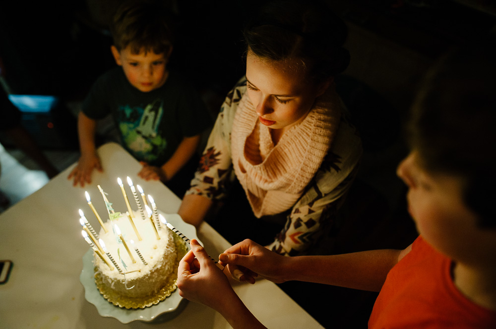 Girl with birthday cake - Documentary Family Photography