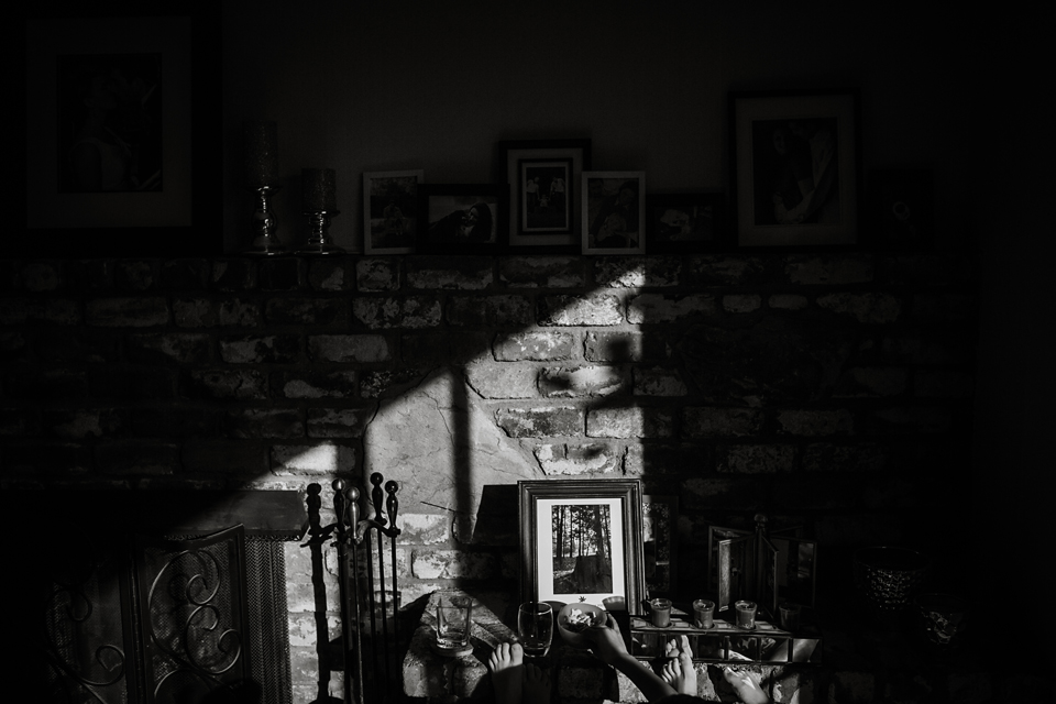 light and shadow on fireplace - Documentary Family Photography