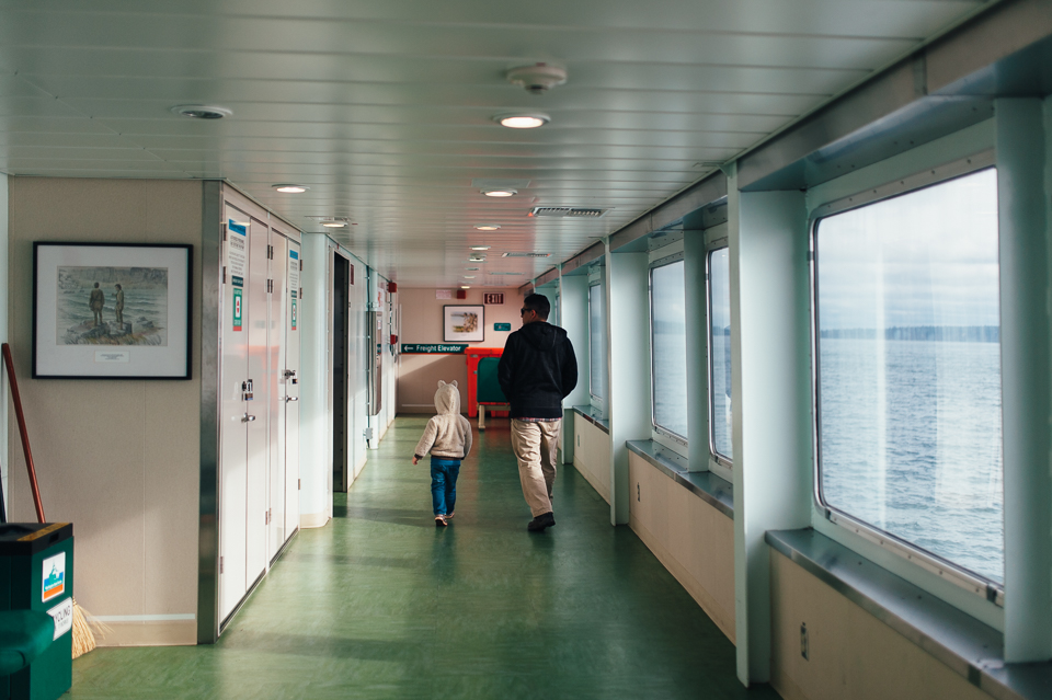 Father and son walk on ferry - Documentary Family Photography