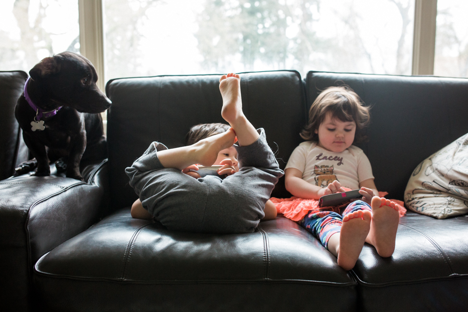 kids lounging on couch - Documentary Family Photography