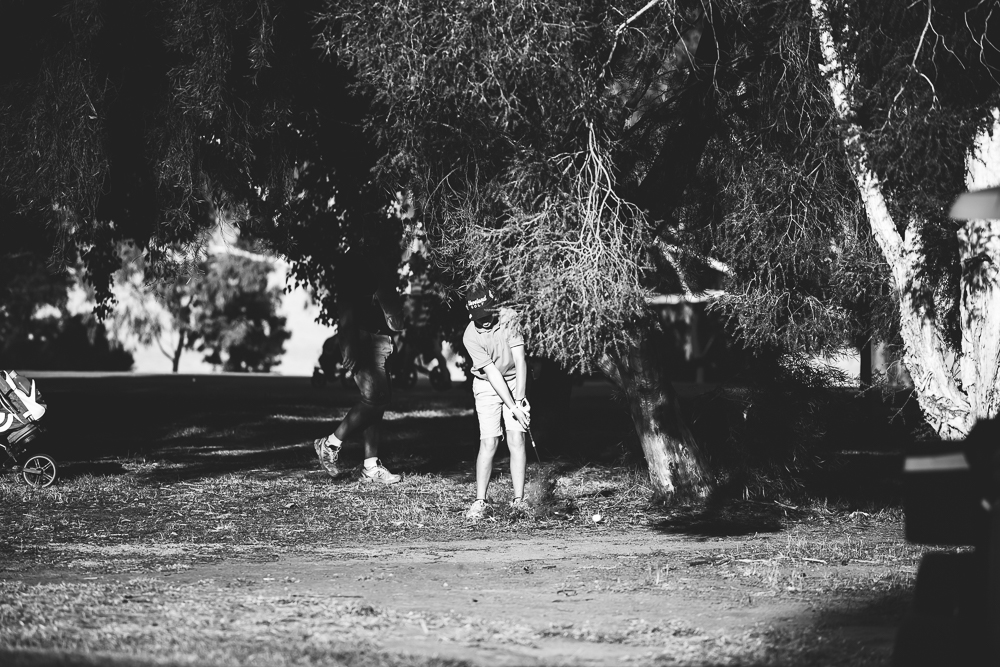 Boy golfing - Documentary Family Photography