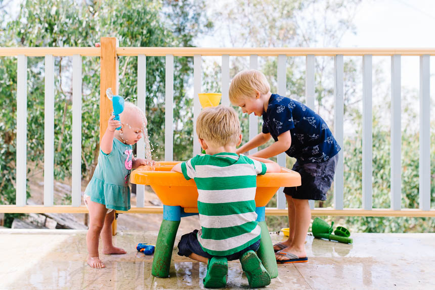 Kids at water table - Documentary Family Photography